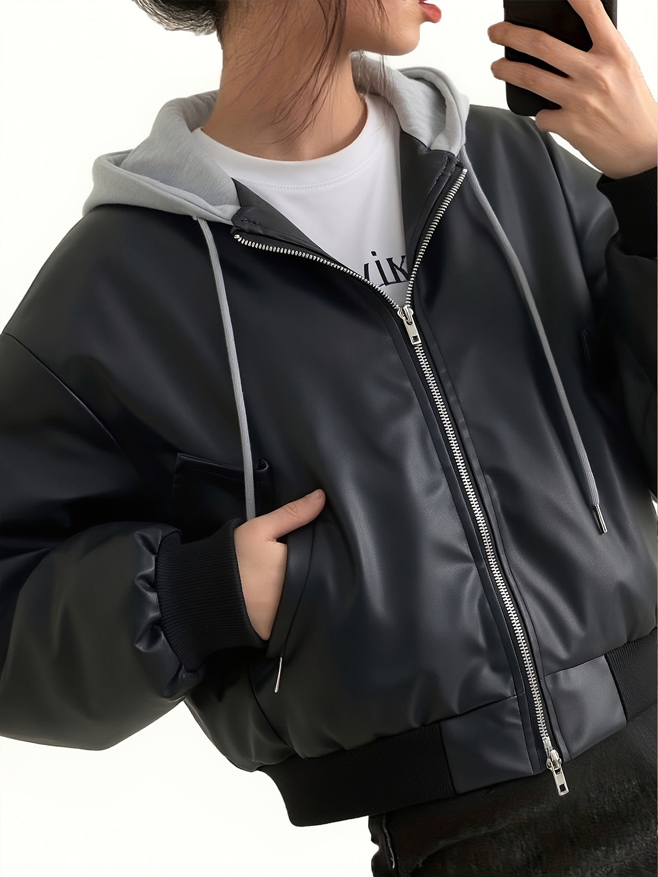 Unisex black bomber jacket with hood made of soft material