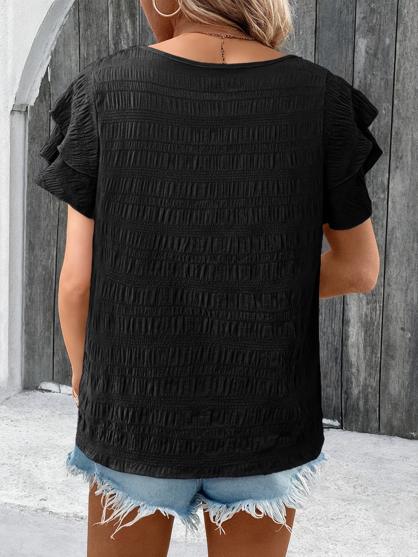 Women's summer blouse with ruffle sleeves and textured design – casual and elegant leisure style