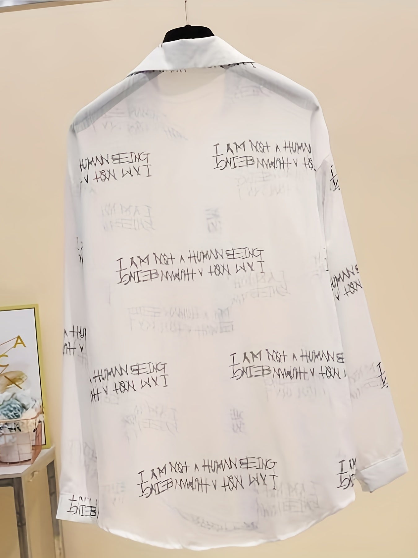 Women's blouse with newspaper print and shorts – fashionable set for leisure and everyday wear