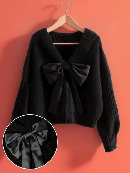 Women's ribbed long-sleeve V-neck sweater with a large bow