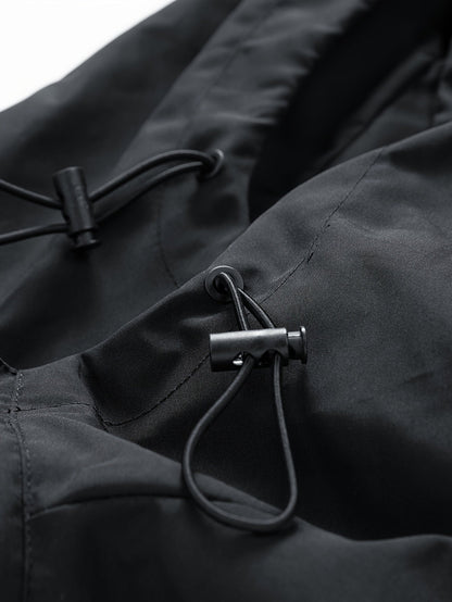 Unisex black windbreaker jacket with hood and red dragon design