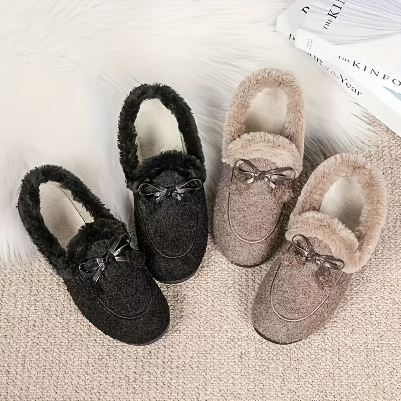 Women's black plush slippers with a bow