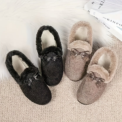 Women's black plush slippers with a bow