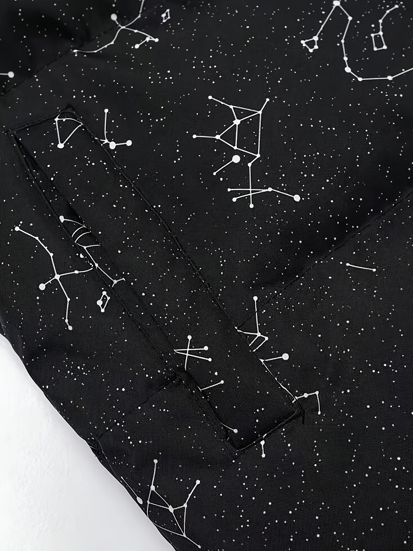 Padded jacket with constellation print, zipper, and stand-up collar