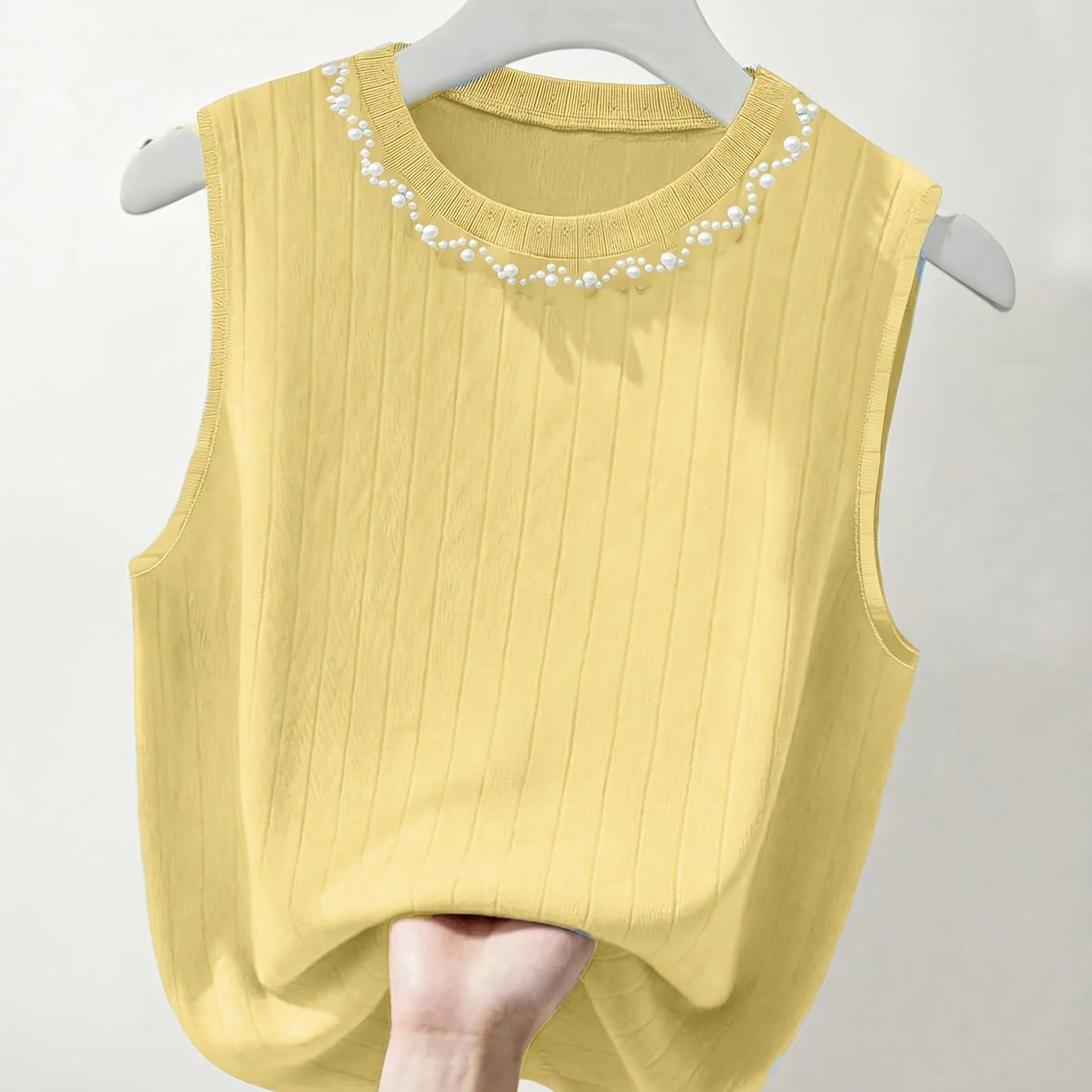 Women's sleeveless knit top with pearl embellishment – Elegant casual look for spring and summer