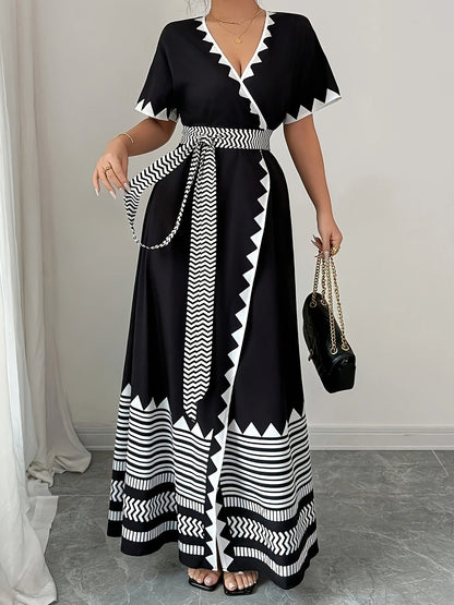 Women's maxi dress with graphic pattern and waist belt – Elegant summer dress for festive occasions