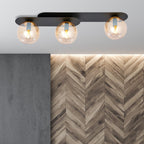 Plafondlamp gepoedercoat staal en glas Plaza, zwart met amberkleurige kappen, 3 lichtpunten, 70 x 18 cm