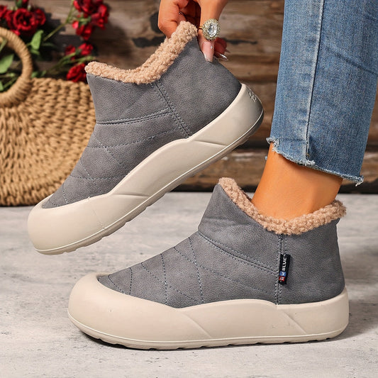 Gefütterte Stiefeletten Grau mit gestepptem Obermaterial und beigefarbenem Plüschfutter