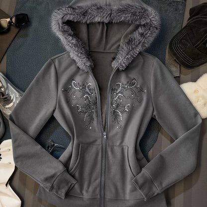 Women's hooded zip-up jacket with faux fur trim and a decorative pattern in gray