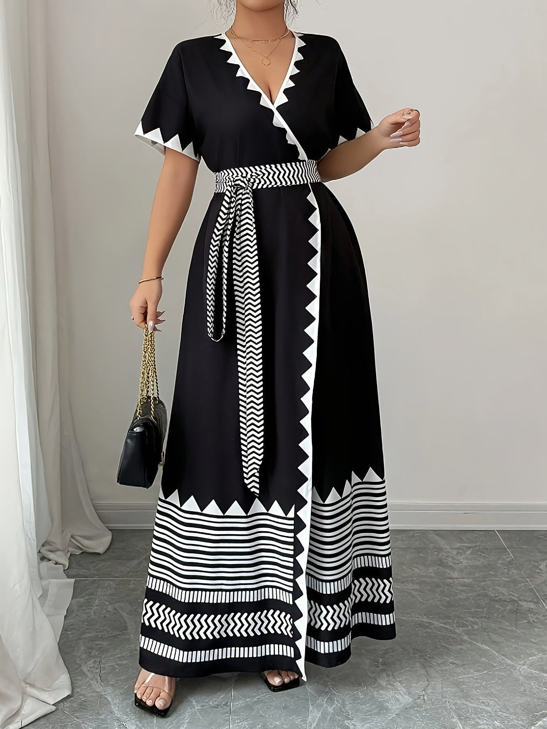 Women's maxi dress with graphic pattern and waist belt – Elegant summer dress for festive occasions