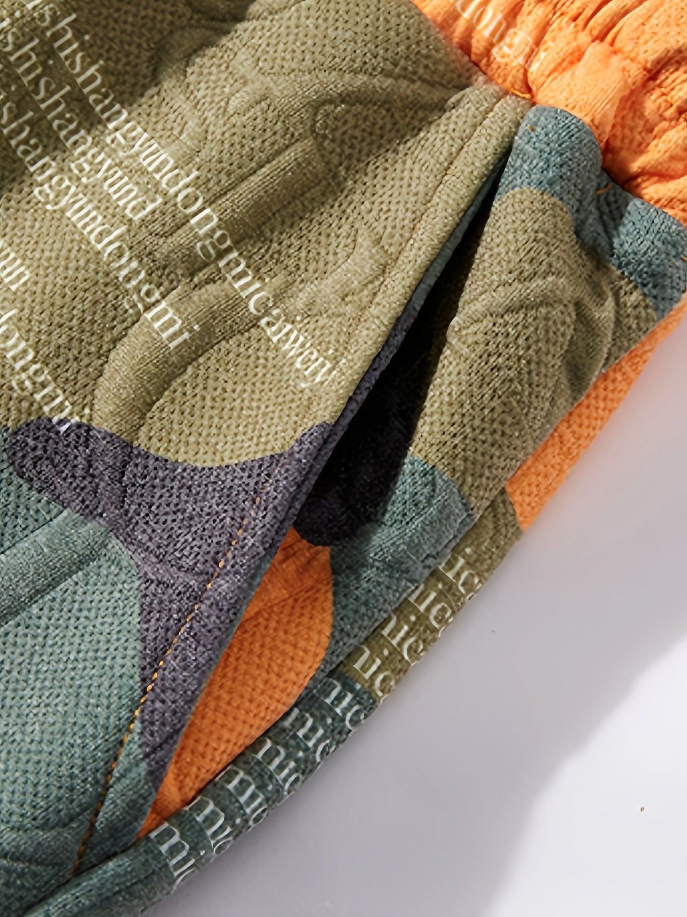 Men's graphic shorts with camouflage embossing and modern street style