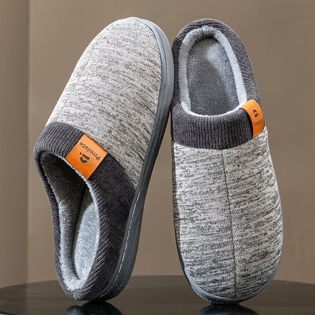 Unisex slippers, marled with a knitted cuff and soft lining