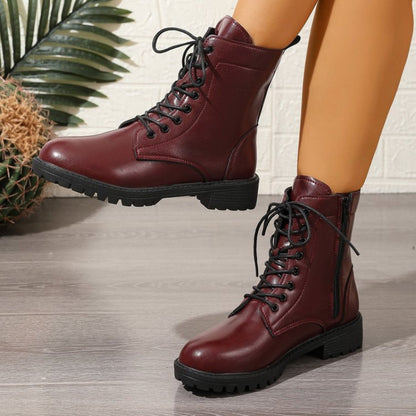Women’s dark red worker boots with laces and a zipper