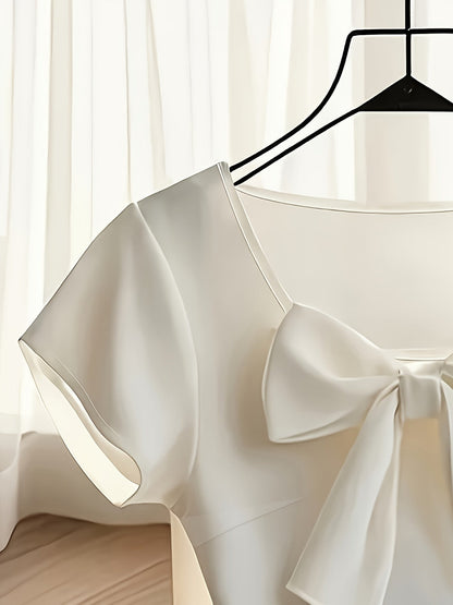 Women's blouse with bow and short sleeves – elegant style for office and special occasions