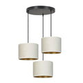 Hanglamp met drie witte stoffen kappen met gouden binnenzijde aan een ronde zwarte canopy