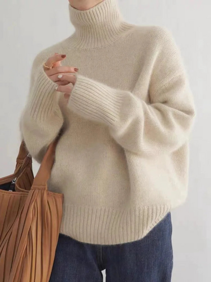 Women's turtleneck sweater in trendy oversized look for autumn and winter, casual and elegant