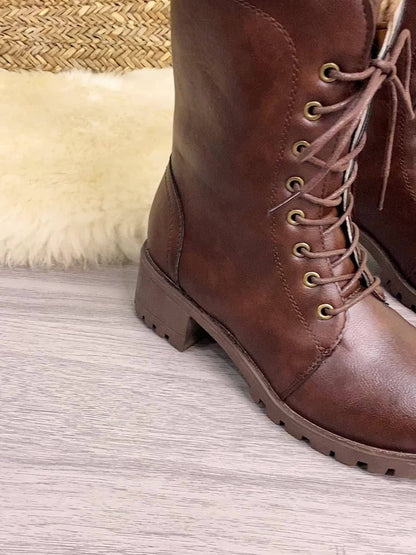 Women's brown lace-up boots with lining and lug soles