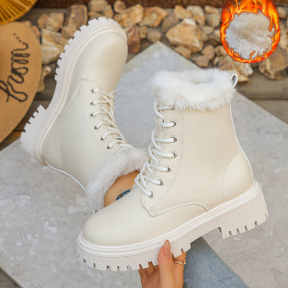 Women's worker boots with faux-fur lining, lacing, and lug soles