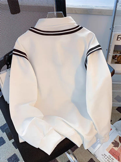 Unisex long-sleeve shirt with a V-neck, white with striped cuffs and “HI” print