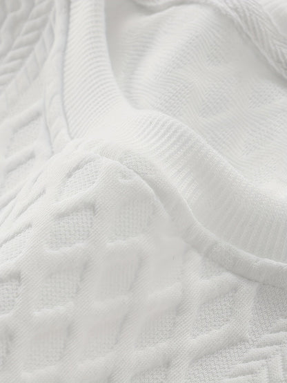 Men's two-piece tracksuit with diamond pattern, long-sleeve shirt, and jogger pants