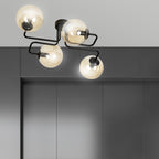 Plafondlamp staal en glas Brendi modern zwart met amber glazen kappen, 4 fittingen E14, 55 cm breed