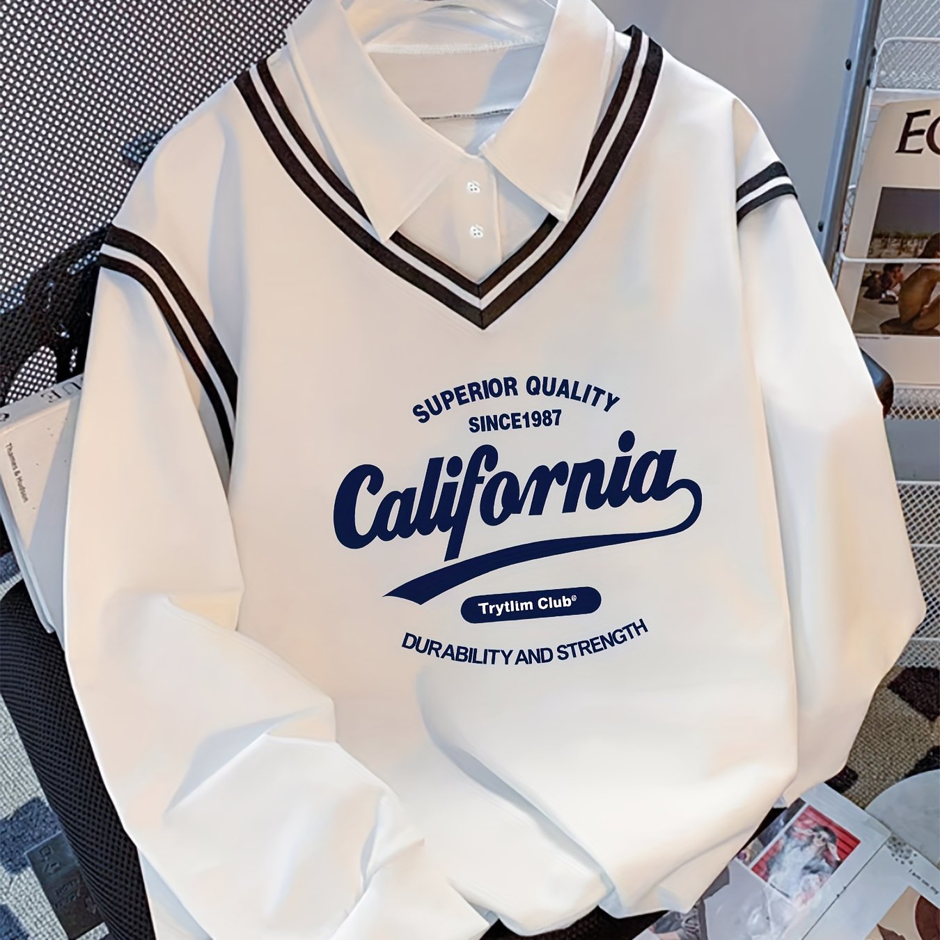 White long-sleeve sweater with collar and California lettering