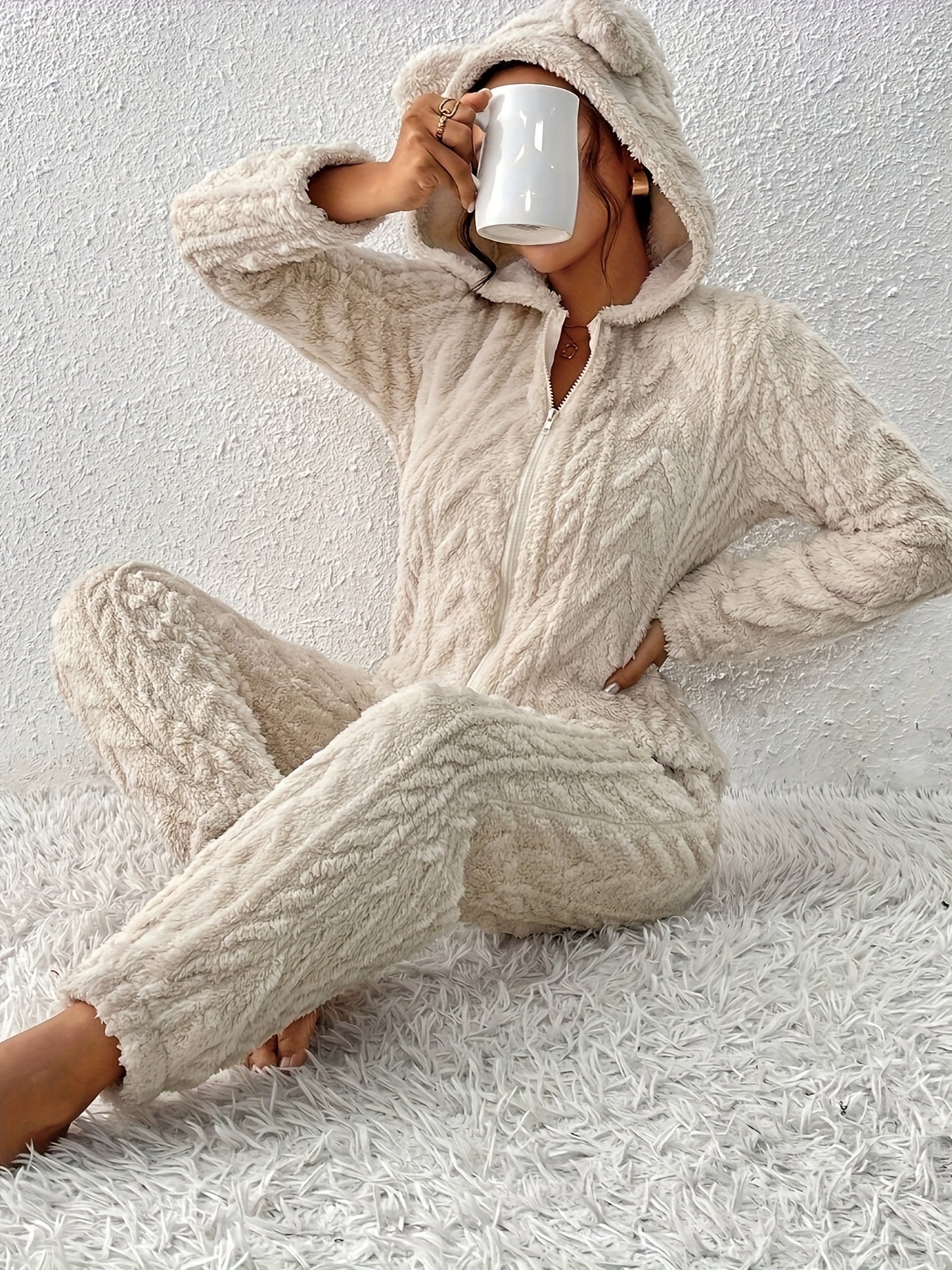 Women's fluffy hooded onesie with ears, light beige