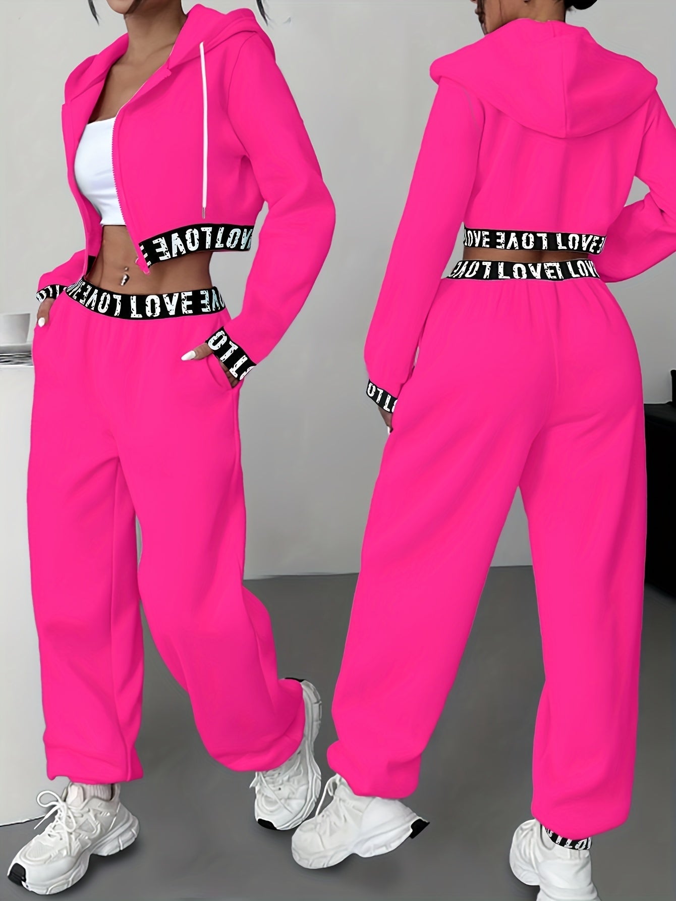 Women's two-piece tracksuit with a hooded jacket and cropped-length joggers featuring a “LOVE” waistband