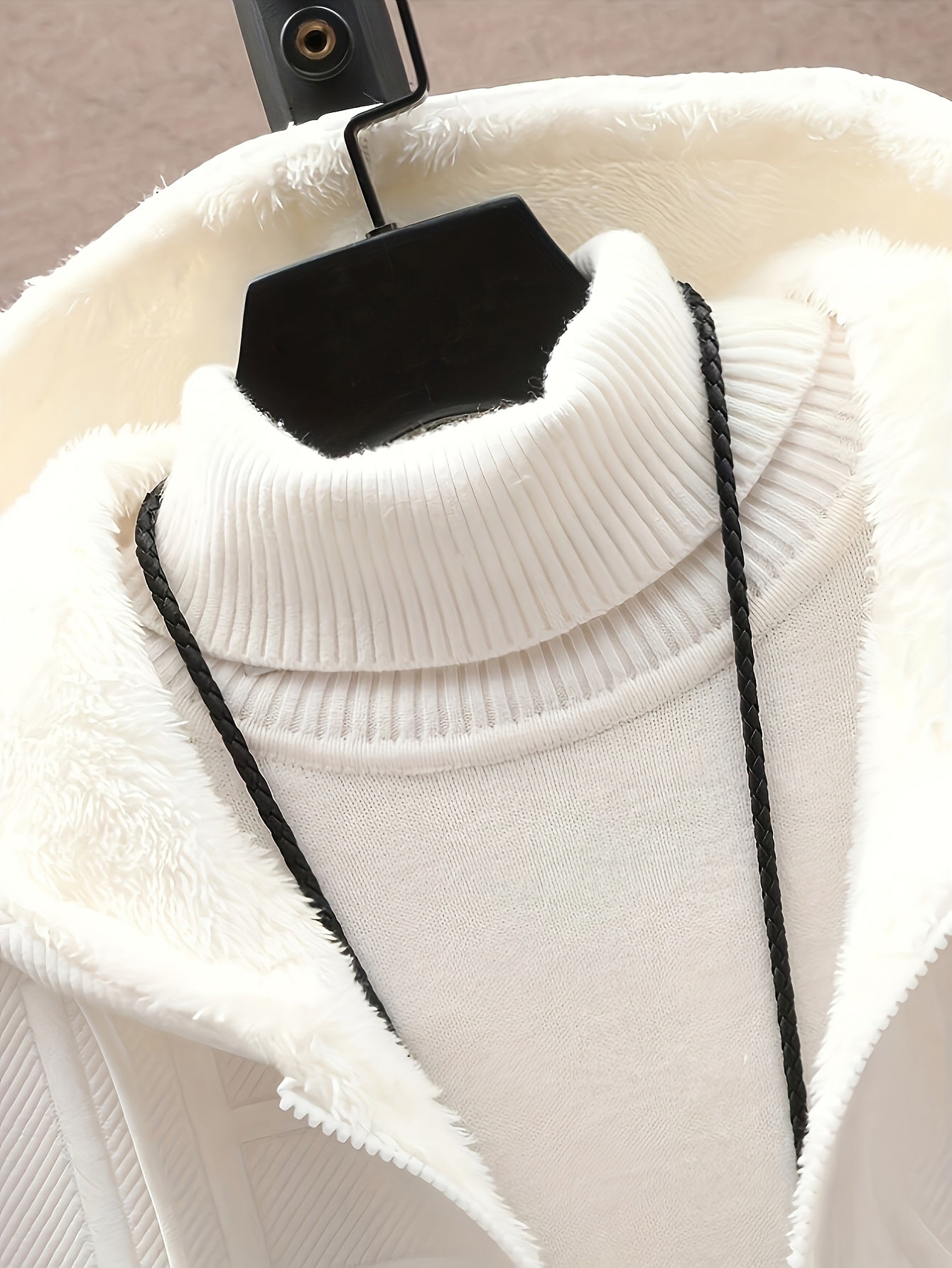 Unisex hooded jacket with fleece lining and raised lettering, zipper, kangaroo pockets, in black