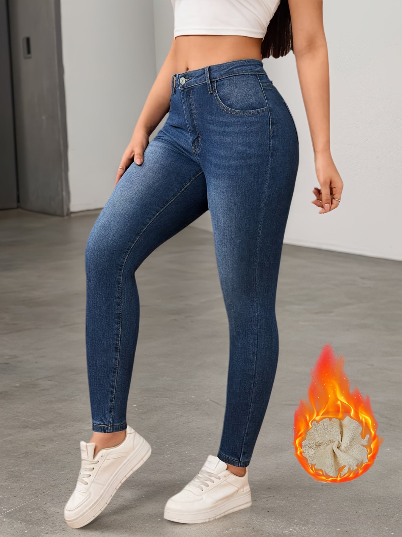 Women's lined slim-fit jeans in dark blue with warm inner lining
