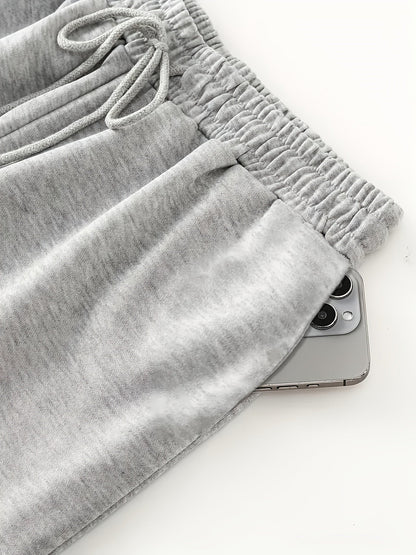 Wide-leg lounge pants with moon phase pattern, elastic waistband