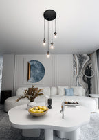 Hanglamp 4 lichts gepoedercoat staal en glas, Cosmo modern, zwart met transparante glazen kappen Ø 14 cm
