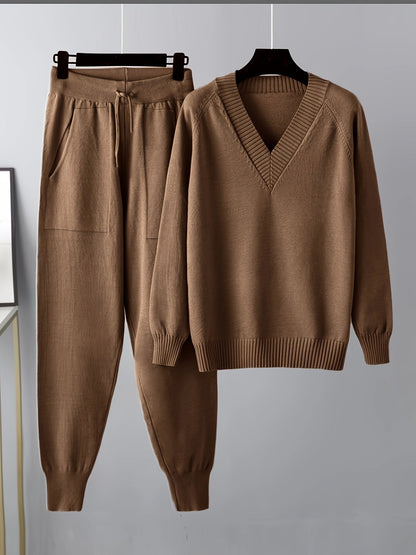 Two-piece women’s knitted set with a V-neck sweater and jogger pants in a beige ribbed-knit design
