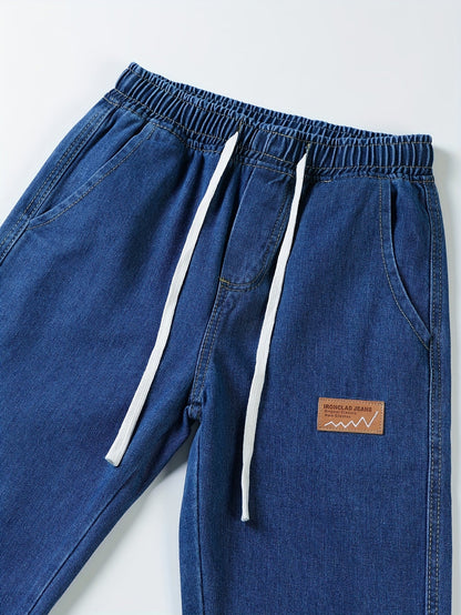 Dark blue jeans with an elastic waistband and drawstring