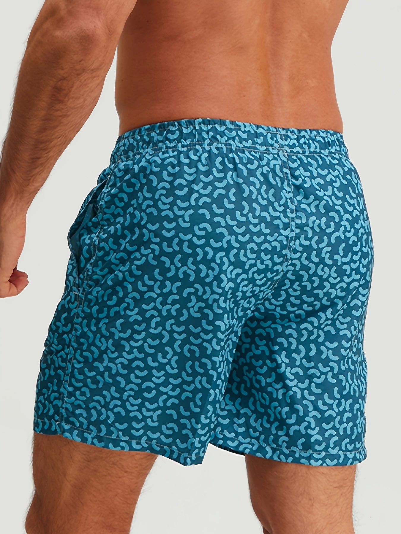 Men's swim shorts with modern pattern, sporty style, ideal for beach and leisure