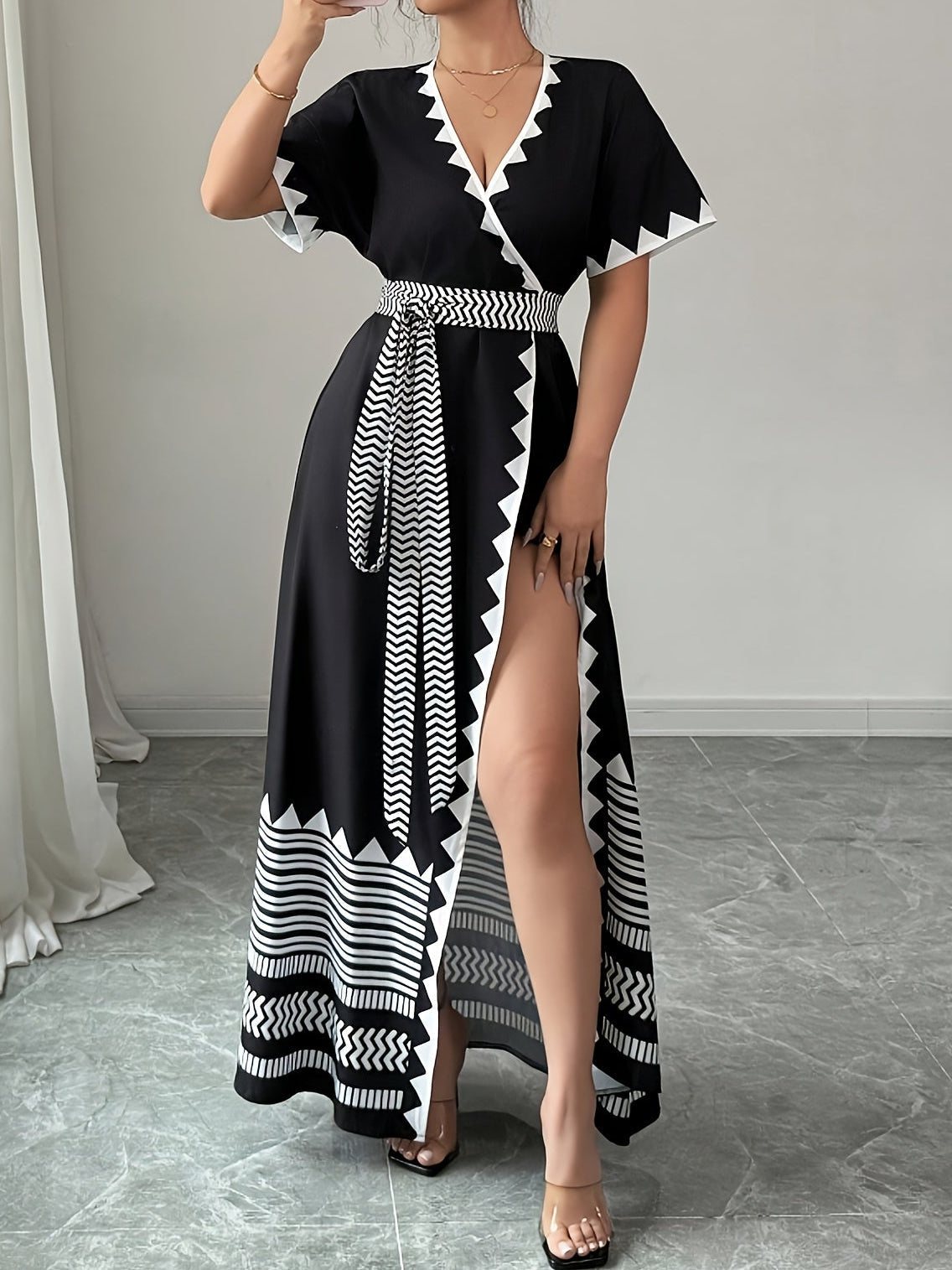 Women's maxi dress with graphic pattern and waist belt – Elegant summer dress for festive occasions