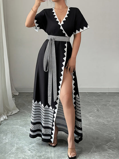 Women's maxi dress with graphic pattern and waist belt – Elegant summer dress for festive occasions