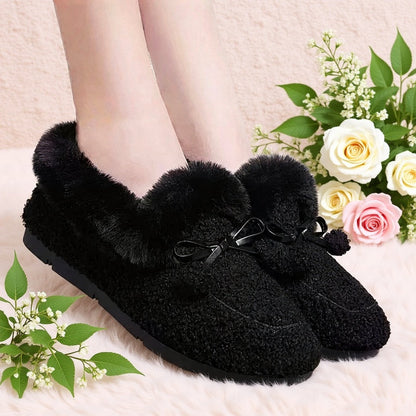 Women's black plush slippers with a bow