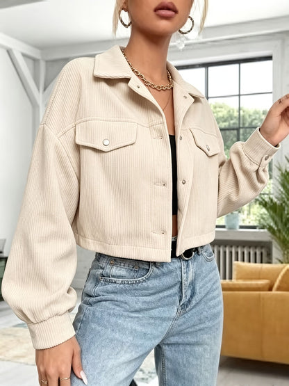 Short women's corduroy jacket with a collar and chest pockets