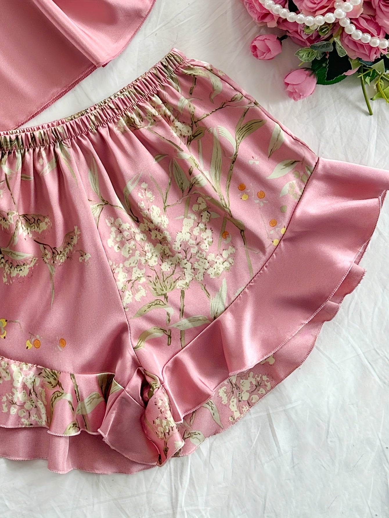 Women's pajama set with floral pattern and ruffles – summer nightwear in an elegant style