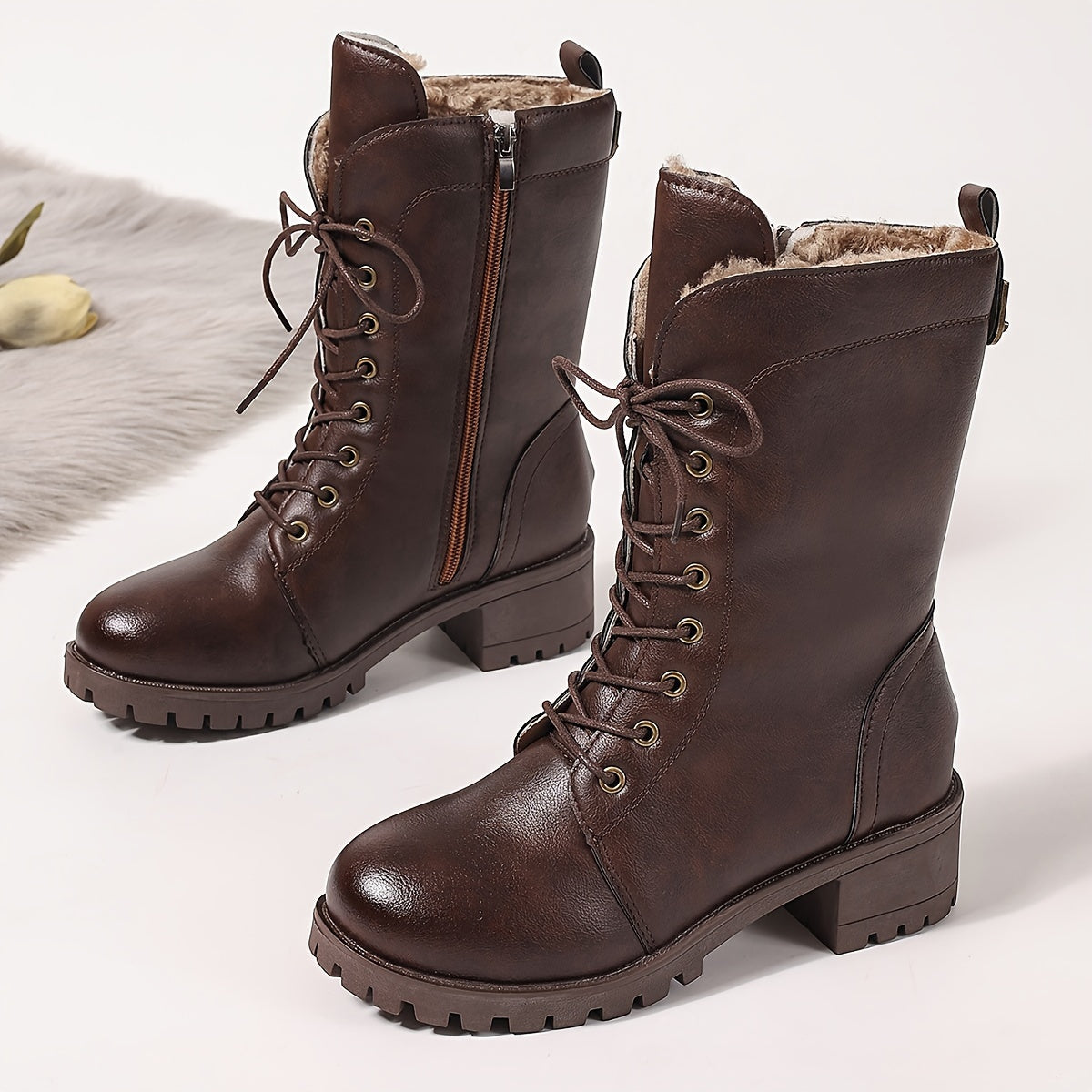 Women's brown lace-up boots with lining and lug soles