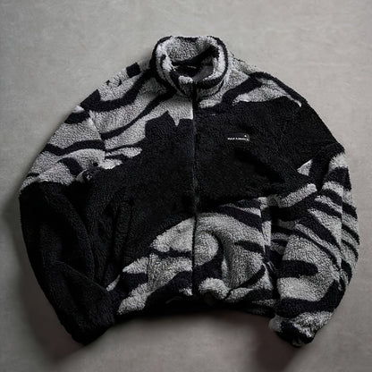 Unisex fleece jacket with stand-up collar, zipper, and animal print