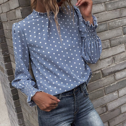 Women's blouse with polka-dot pattern, stand-up collar, and gathered sleeves