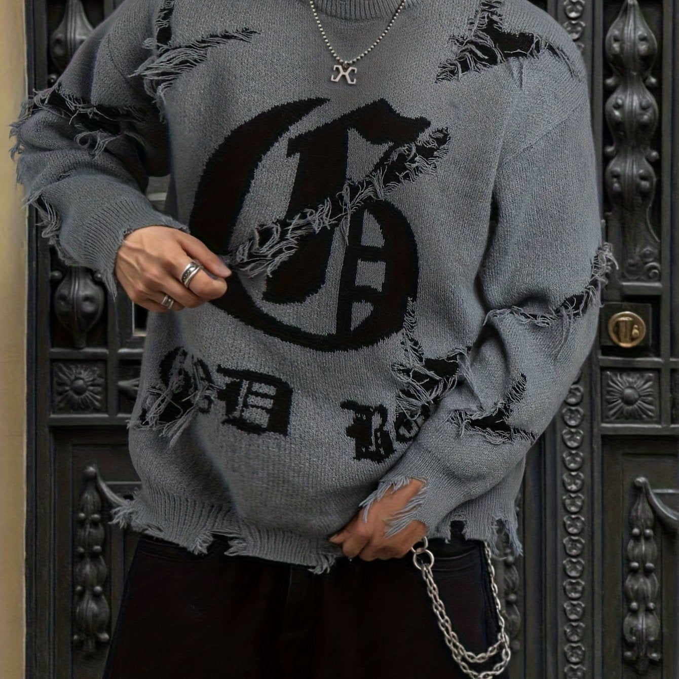 Unisex distressed pullover with a crew neck and statement print