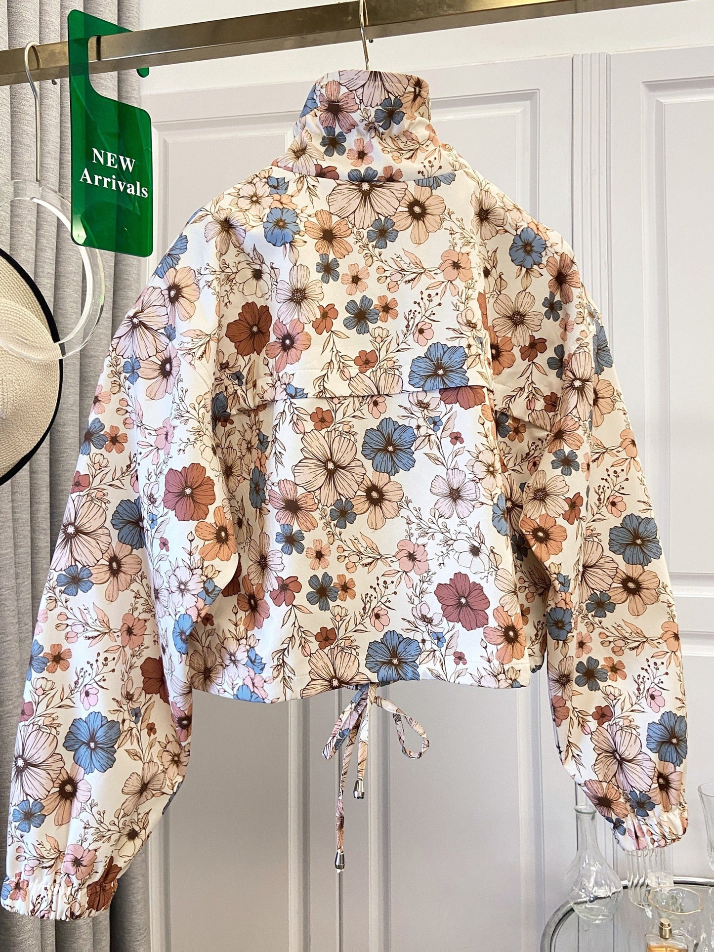 Women’s short jacket with stand-up collar and patterned print