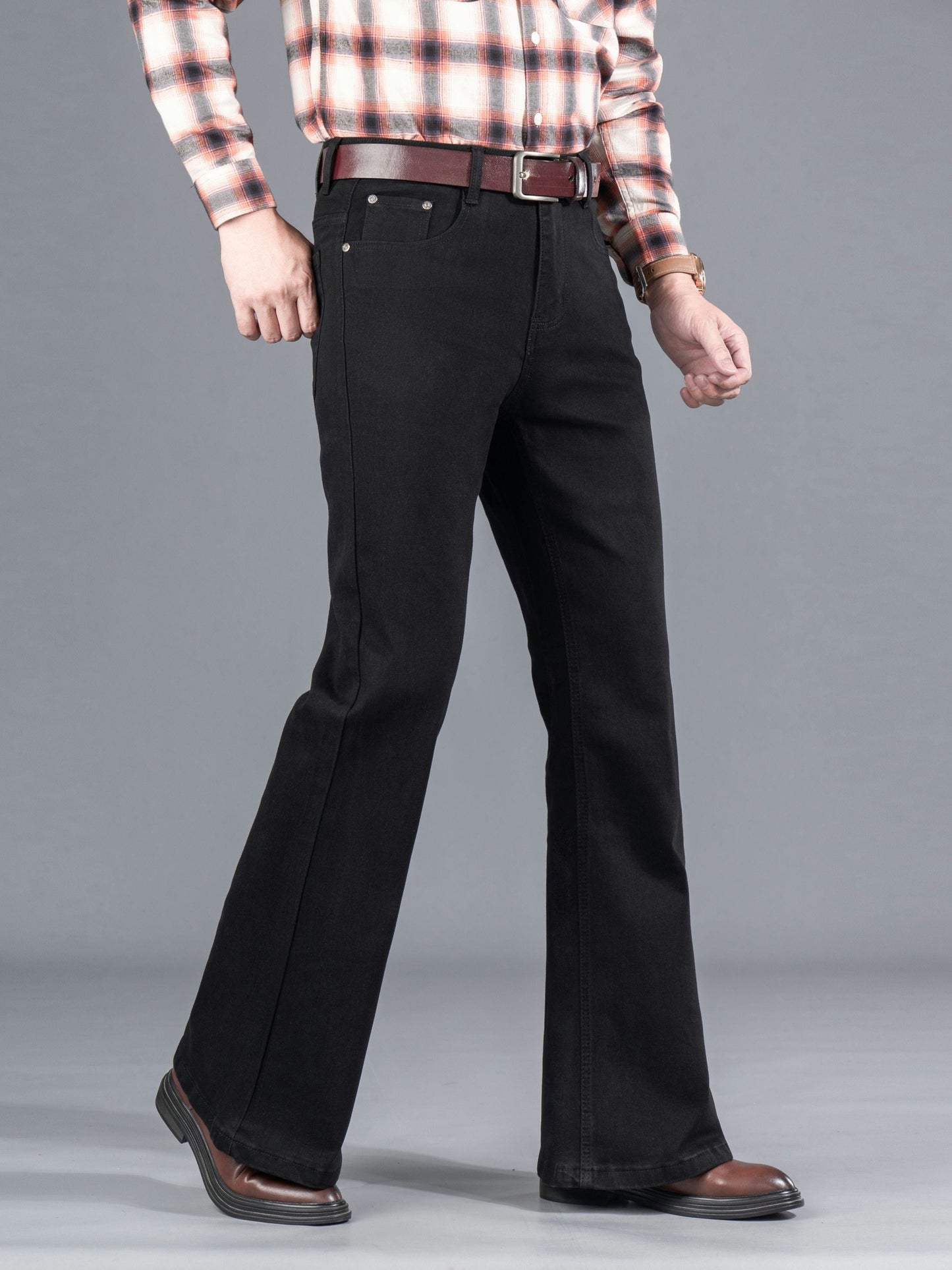 Men's black bootcut jeans with a flared leg, regular fit