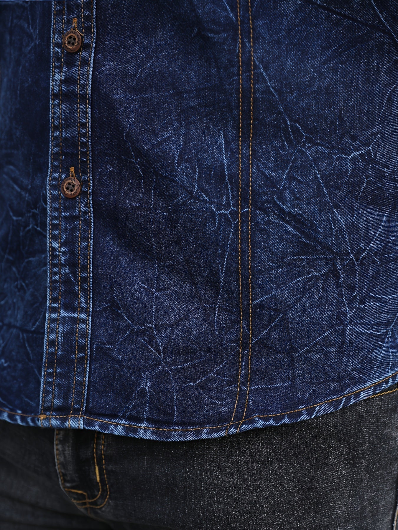 Men's long-sleeve dark blue denim shirt with chest pockets in a worn look