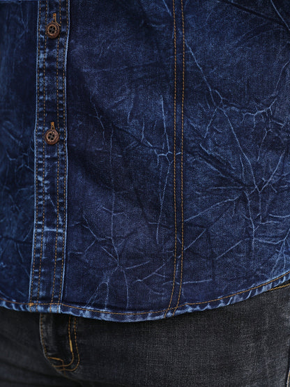 Men's long-sleeve dark blue denim shirt with chest pockets in a worn look