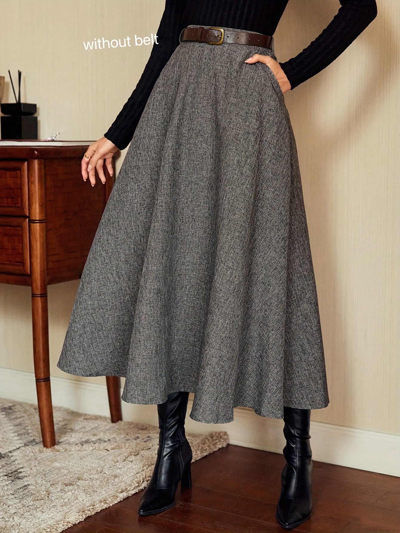Women's gray A-line midi skirt with a flared hem