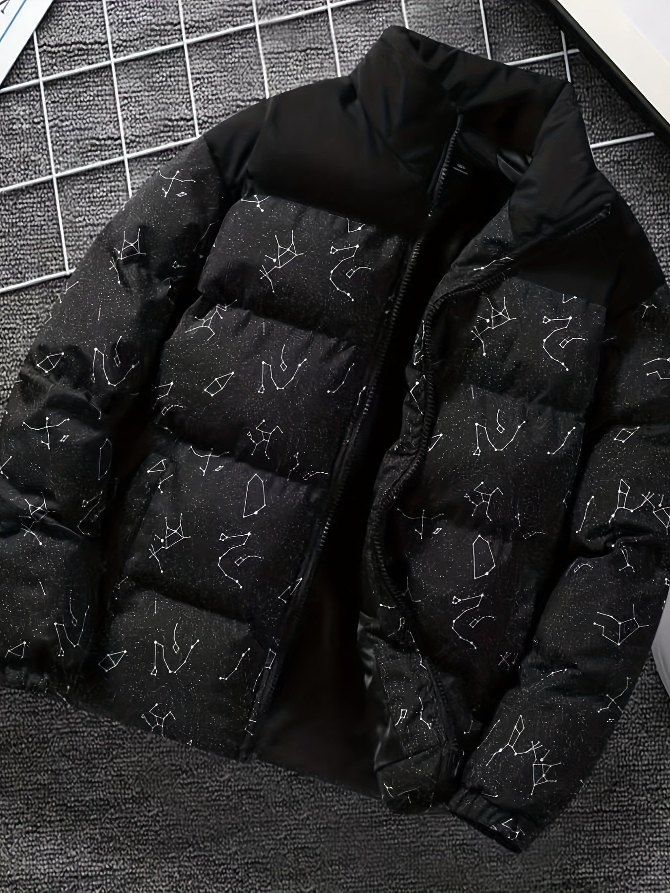 Padded jacket with constellation print, zipper, and stand-up collar